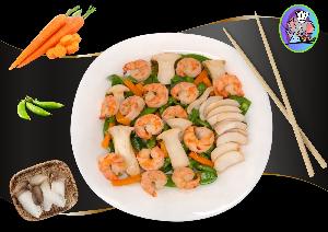 Sauté de crevettes aux champignons eryngii, carottes et pois gourmand